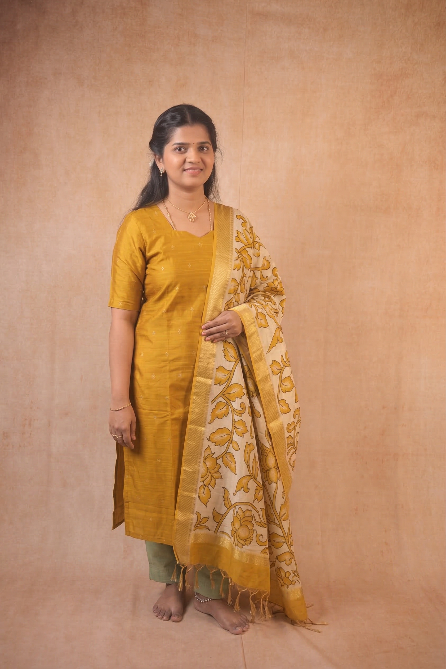 Yellow kurta with kalamkari shawl