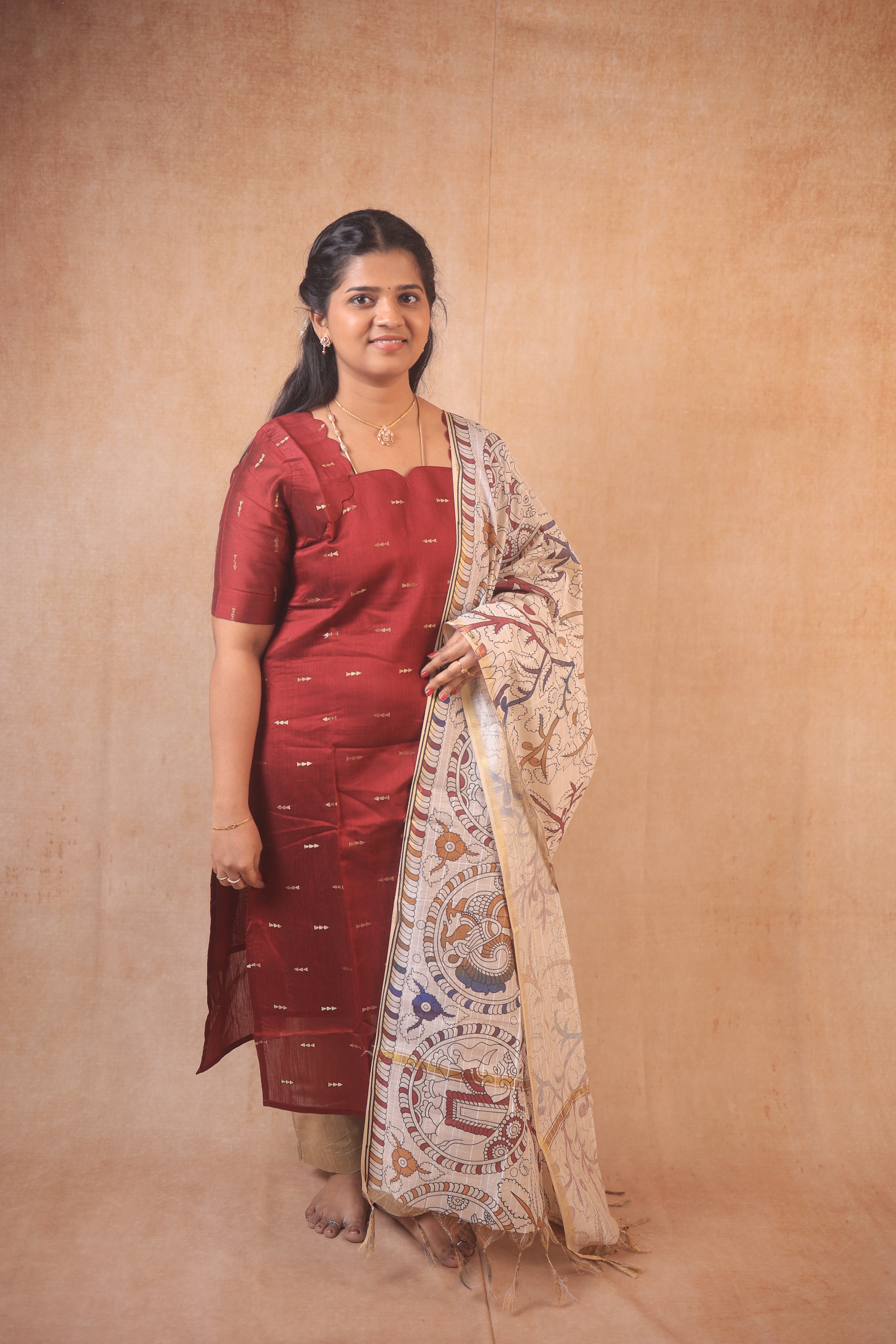 Red kurta with kalamkari shawl